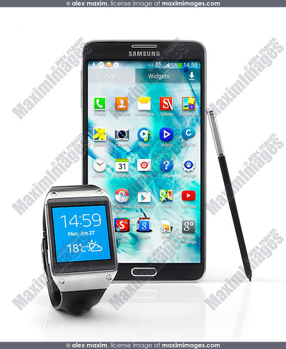 Samsung Galaxy Gear smartwatch and Galaxy Note III smartphone isolated on white background