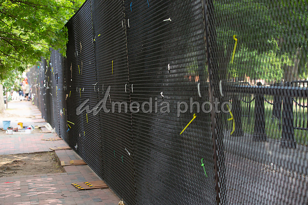 Ties are left over from signs that were displayed on the additional White House fencing in Washington D.C., U.S., on Wednesday, June 10, 2020. Additional fencing had been set up near the White House in response to the demonstrations caused by the death of George Floyd while he was in police custody on May 25, 2020. Credit: Stefani Reynolds / CNP/AdMedia