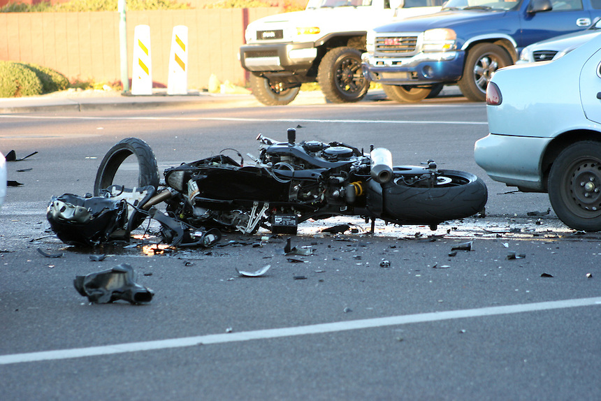 AJ ALEXANDER/AJA - A Fatal Motorcycle vs Car on Greenway and 40th St, Phoenix, AZ on or about 5 pm, still light and a clear evening on Wed, December 26, 2012. The motorcycle driver was wearing a helmet traveling eastbound on the intercection of Greenway and 40th St. while the Car driver was traveling west bound and making a left hand turn south bound impacting on the eastbound lane at the intercection.Photo by AJ ALEXANDER (c)