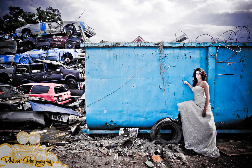 Jessica Steck Tuesday, April 20, 2010, during a trash the dress shoot at the U Pull It in DeLand, Florida. The dress is a Vera Wang from The Collection, hair by Rachel Ellerby and Makeup by Camila Santos. (Chad Pilster, http://www.PilsterPhotography.net.)