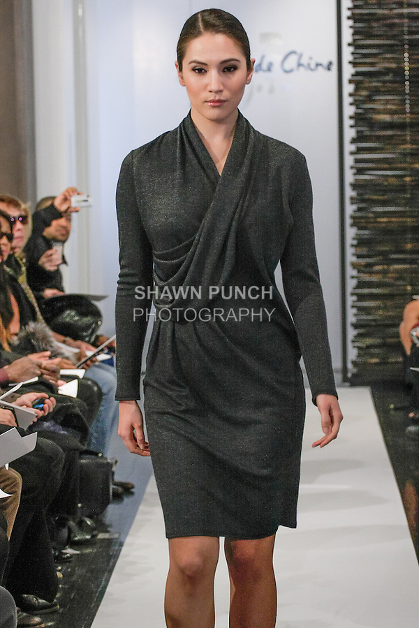 Model walks runway in an outfit from the from the Blanc de Chine Fall Winter 2013 Dunhuang collection, at 673 Fifth Avenue NYC, during New York Fashion Week Fall 2013 on February 10, 2013.