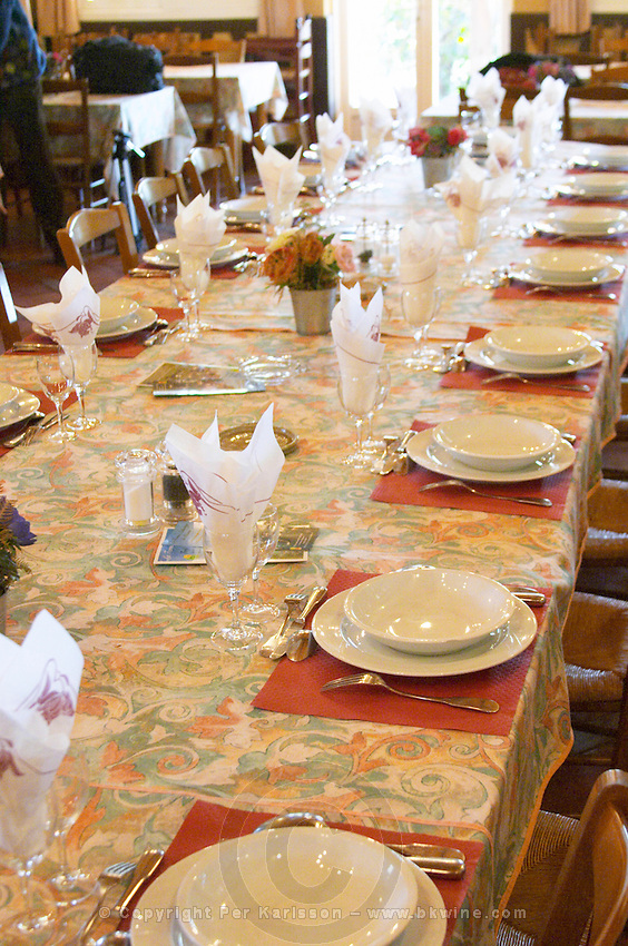 Lunch table set for many guests ready to be served duck specialities. Ferme de Biorne duck and fowl farm Dordogne France