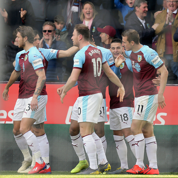 Burnley's Chris Wood (right) is mobbed by team-mates as he celebrates scoring the opening goal <br />
<br />
Photographer Rich Linley/CameraSport<br />
<br />
The Premier League - Burnley v Wolverhampton Wanderers - Saturday 30th March 2019 - Turf Moor - Burnley<br />
<br />
World Copyright © 2019 CameraSport. All rights reserved. 43 Linden Ave. Countesthorpe. Leicester. England. LE8 5PG - Tel: +44 (0) 116 277 4147 - admin@camerasport.com - www.camerasport.com