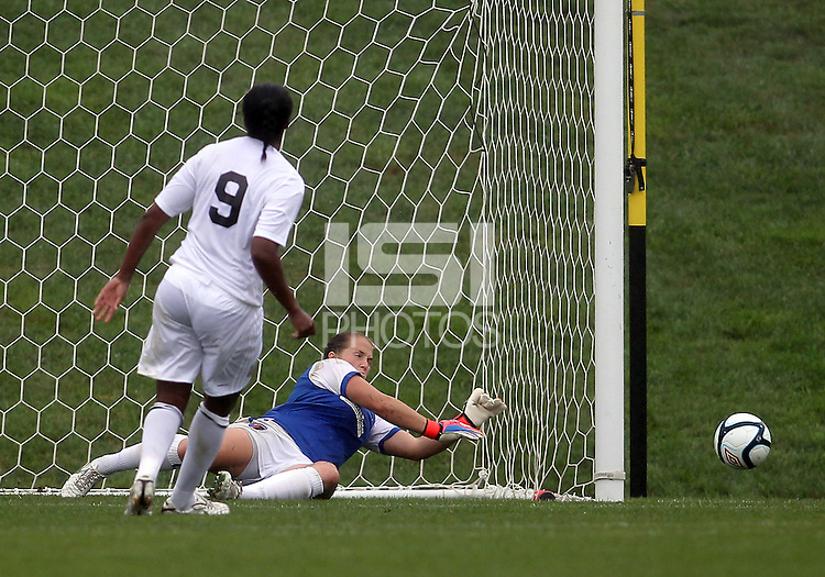 BOYDS, MARYLAND - July 21, 2012: Robyn Jones (39) of Charlotte Lady Eagles stops a penalty shot by Ashley Peter (9) of the Long Island Roughriders during a W League Eastern Conference Championship semi final match at Maryland Soccerplex, in Boyds, Maryland on July 21.