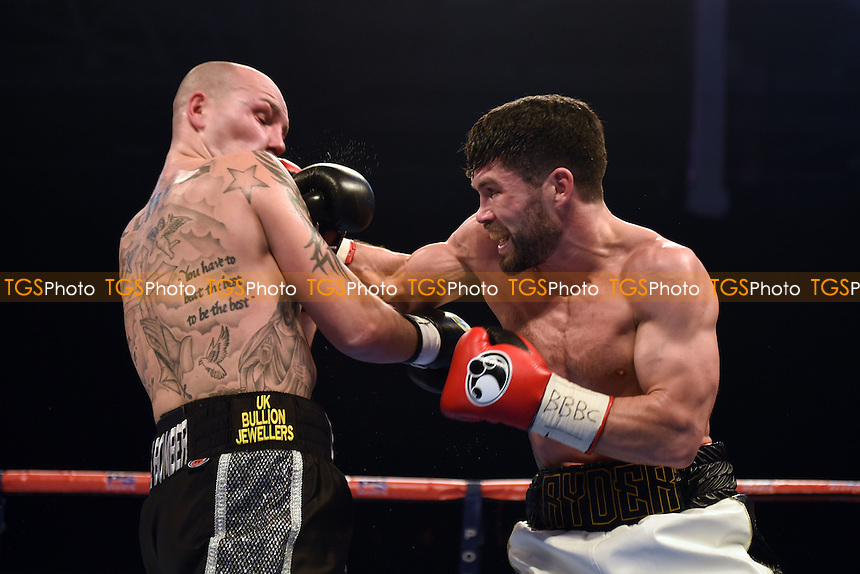 John Ryder (white shorts) defeats Adam Etches during a Boxing Show at Olympia on 4th February 2017