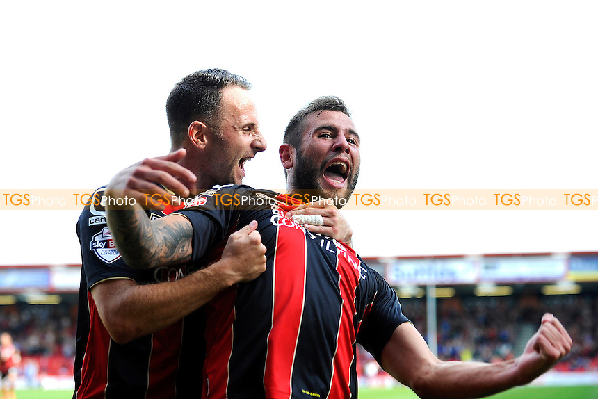 Marc Pugh of AFC Bournemouth congratulates Steve Cook of AFC Bournemouth right after scoring - AFC Bournemouth vs Rotherham United - Sky Bet Championship Football at the Goldsands Stadium, Kings Park, Boscombe, Bournemouth, Dorset - 13/09/14 - MANDATORY CREDIT: Denis Murphy/TGSPHOTO - Self billing applies where appropriate - contact@tgsphoto.co.uk - NO UNPAID USE