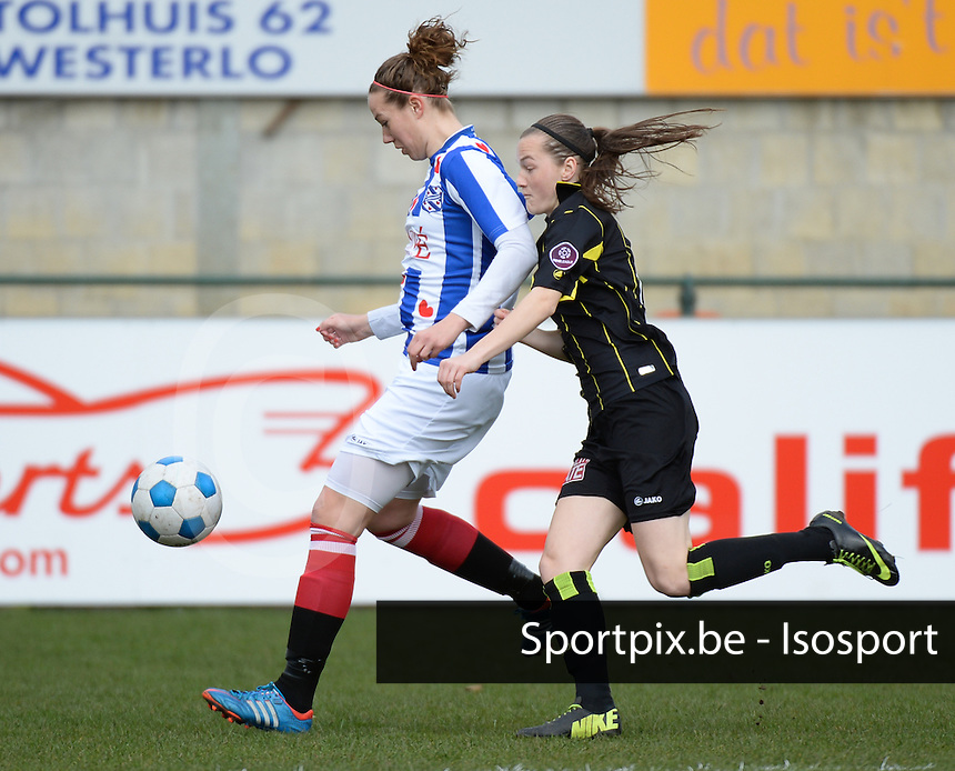 20140315 - WESTERLO , BELGIUM : Heerenveen Charissa Burgwal pictured with Lierse Elke Van Gorp (r) during the soccer match between the women teams of SK Lierse Dames and SC Heerenveen Vrouwen , on the 19th matchday of the BeNeleague competition Saturday 15 March 2014 in Westerlo . PHOTO DAVID CATRY