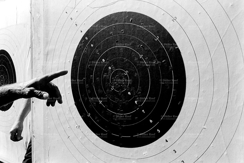 Switzerland. Canton Bern. Guttannen. Every year, on August 14, the village of Guttannen organizes a shooting competition to commemorate the battlefield's memory from August 14, 1779 which took place on the Grimsel pass between the French and Austrian troops. More than 450 shooters (men and women) aim their rifles and automatic or semi-automatic assault rifles SG 550 on targets distant 380 meters. 14.08.2017 © 2017 Didier Ruef
