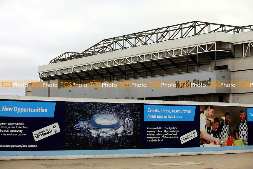 An artists impression of Tottenham's new 61,000 capacity stadium redevelopment is displayed on the outside walls surrounding the existing stadium during Tottenham Hotspur FC Ground Redevelopment at White Hart Lane, London, England on 10/11/2015