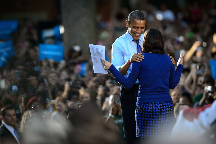 President of the United States Barack Obama greets Ohio University student Shannon Welch, a senior majoring in Political Science and minoring in French, and the current President of the OU College Democrats. Obama spoke to a crowd of nearly 14,000 on Ohio University's College Green in Athens, Ohio, on Wednesday, October 17, 2012. (© 2012 Brien Vincent)