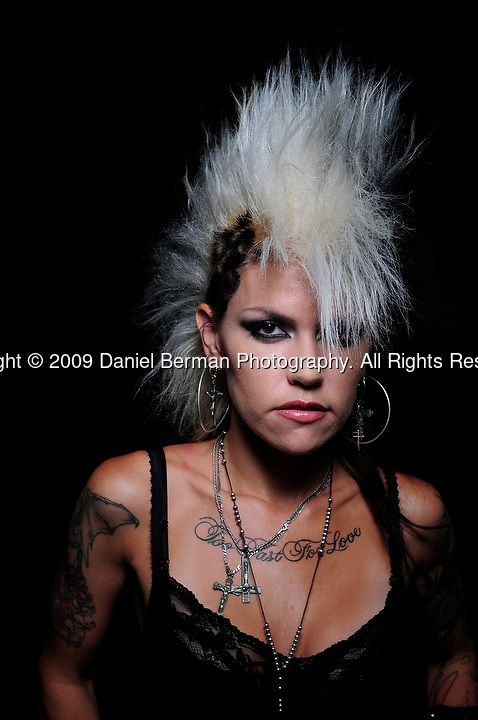 poses for a portrait during day 1 of the Seattle Tattoo Expo at Seattle Center Friday August 7, 2009. The expo continues until Sunday evening. Photo by Daniel Berman/SeattlePI.com