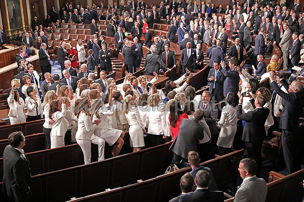 Democratic women wearing white in response to Representative Lois Frankel's call to acknowledge the voters who handed Democrats a majority in the House in the midterm elections and a reminder that they plan to make women's economic security a priority prior to US President Donald J. Trump delivers his second annual State of the Union Address to a joint session of the US Congress in the US Capitol in Washington, DC on Tuesday, February 5, 2019. Photo Credit: Alex Edelman/CNP/AdMedia