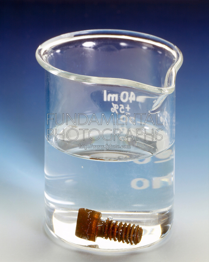 DENSITY COMPARISON WITH IRON BOLT (1 of 2)<br />
Water & Iron<br />
An iron bolt sinks in water because iron has a density of 7.86 and water has a density of 1.00.