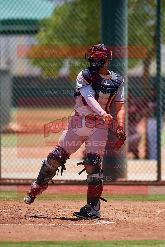 AZL Indians Red catcher Yainer Diaz (4) throws to third base after a strikeout during an Arizona League game against the AZL Indians Blue on July 7, 2019 at the Cleveland Indians Spring Training Complex in Goodyear, Arizona. The AZL Indians Blue defeated the AZL Indians Red 5-4. (Zachary Lucy/Four Seam Images)