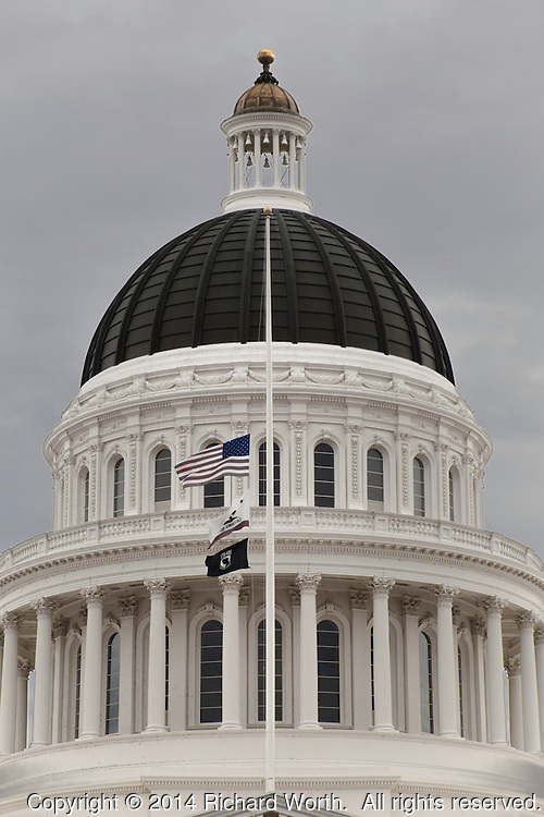 Flags at the California State Capitol flying at half-staff in recognition of Pomona Police Department Officer Shaun Diamond who was shot while serving a search warrant. He died Oct. 29, 2014.