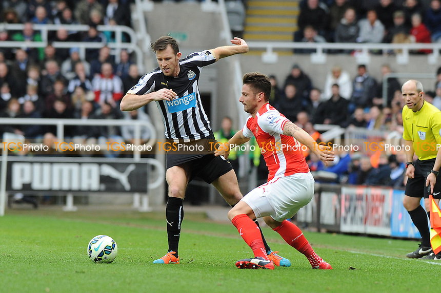 Michael Williamson of Newcastle United battles with Calum Chambers of Arsenal - Newcastle United vs Arsenal - Barclays Premier League Football at St James Park, Newcastle upon Tyne - 21/03/15 - MANDATORY CREDIT: Steven White/TGSPHOTO - Self billing applies where appropriate - contact@tgsphoto.co.uk - NO UNPAID USE