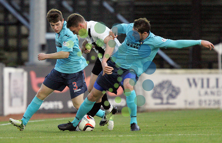 Ayrs Kevin Kyle getting the squeez from the Pars defence of Alex Whittle and Calum Morris<br />
<br />
4 th round of the William Hill Scottish Cup the game between Ayr United V Dunfermline played at Somerset Park Picture by Alistair Mulhearn / Universal News and Sport (Scotland). All pictures must be credited to www.universalnewsandsport.com. (Office) 0844 884 51 22 30/11/2013
