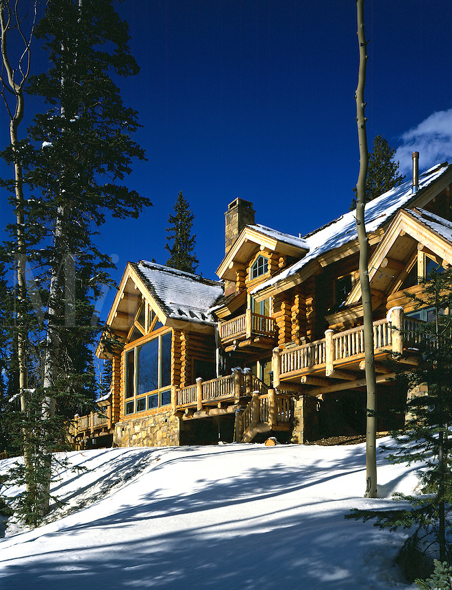 Contemporary log house in snow at Mountain Village, Telluride, CO. Telluride, Colorado.
