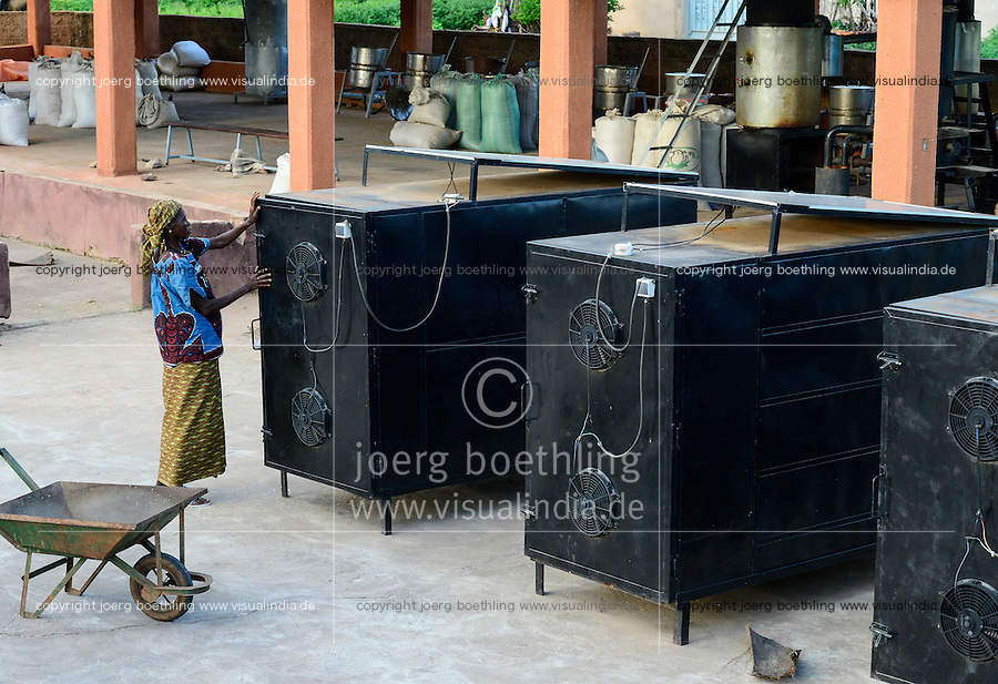 BURKINA FASO, Bobo Dioulasso, village Bama, rice mill, rice drying unit with solar energy use / BURKINA FASO, Bobo Dioulasso, Dorf Bama, SNV Reismuehle, Reis Trocknungsanlage mit Solarenergie Nutzung