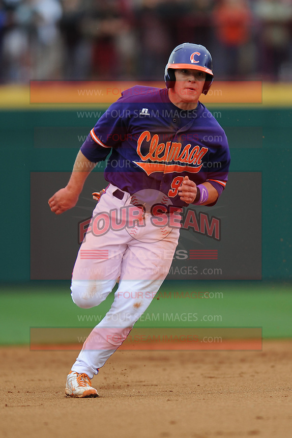 Catcher Phil Pohl #9 of the Clemson Tigers on his way to third during a game against the South Carolina Gamecocks at Carolina Stadium on March 3, 2012 in Columbia, South Carolina. The Gamecocks defeated the Tigers 9-6. Tony Farlow/Four Seam Images.