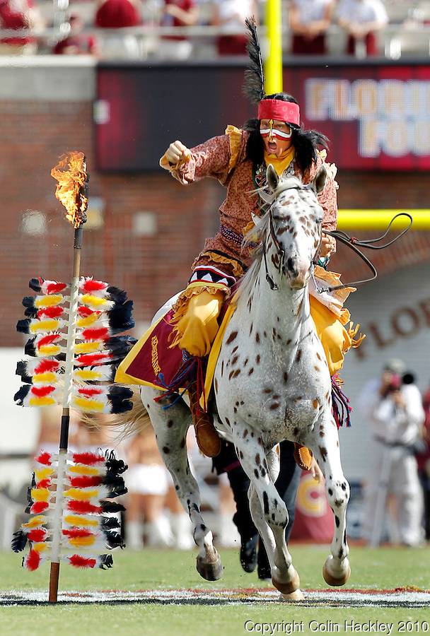 TALLAHASSEE, FL 9/25/10-FSU-WF FB10 CH-Florida State Mascot Chief Osceola portrayed by Drake Anderson rides Renegade off the field prior to the Wake Forest game Saturday at Doak Campbell Stadium in Tallahassee. .COLIN HACKLEY PHOTO