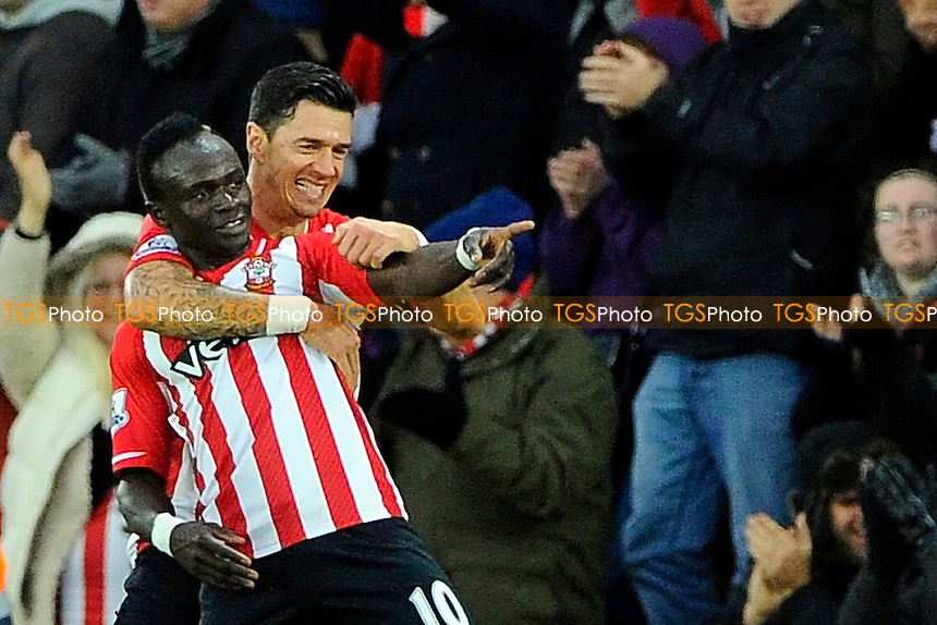 Goalsacorer Sadio Mane of Southampton celebrates with Jose Fonte of Southampton - Southampton vs Arsenal - Barclays Premier League Football at St Mary's Stadium, Southampton, Hampshire - 01/01/15 - MANDATORY CREDIT: Denis Murphy/TGSPHOTO - Self billing applies where appropriate - contact@tgsphoto.co.uk - NO UNPAID USE