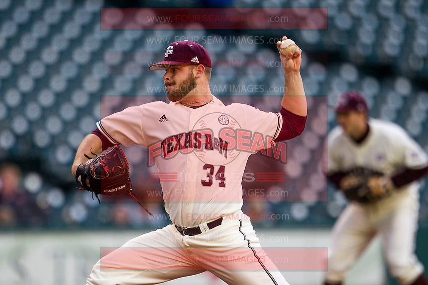 Texas A&M Aggies pitcher A.J. Minter (34) delivers a pitch to the plate during Houston College Classic against the Nebraska Cornhuskers on March 6, 2015 at Minute Maid Park in Houston, Texas. Texas A&M defeated Nebraska 2-1. (Andrew Woolley/Four Seam Images)