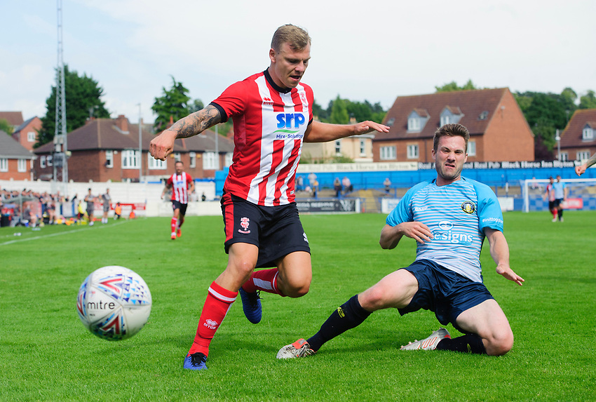 Lincoln City's Harry Anderson vies for possession with Gainsborough Trinity's Jamie Green<br />
<br />
Photographer Chris Vaughan/CameraSport<br />
<br />
Football Pre-Season Friendly (Community Festival of Lincolnshire) - Gainsborough Trinity v Lincoln City - Saturday 6th July 2019 - The Martin & Co Arena - Gainsborough<br />
<br />
World Copyright © 2018 CameraSport. All rights reserved. 43 Linden Ave. Countesthorpe. Leicester. England. LE8 5PG - Tel: +44 (0) 116 277 4147 - admin@camerasport.com - www.camerasport.com