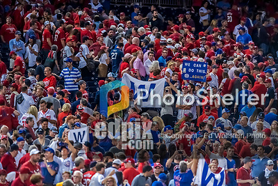 6 October 2017: Washington Nationals fans leave their seats disappointed as Chicago Cubs fans enjoy a first game victory of the NLDS at Nationals Park in Washington, DC. The Cubs shut out the Nationals 3-0 to take a 1-0 lead in their best of five Postseason series. Mandatory Credit: Ed Wolfstein Photo *** RAW (NEF) Image File Available ***