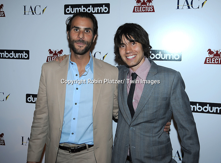 Ben Silverman and Ricky Van Veen posing for photographers at the launch of DumbDumb on June 10, 2010 at the IAC Building in New York City. DumbDumb is Will Arnett and Jason Bateman's New Comedic Content and Marketing Company.