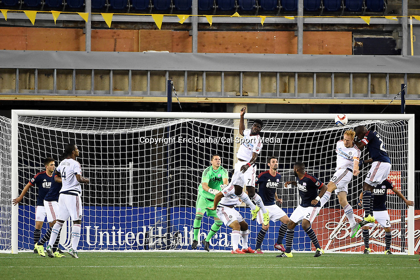 June 13, 2015 - Foxborough, Massachusetts, U.S. - New England Revolution defender Jose Goncalves (23) heads the ball away from goalkeeper Bobby Shuttleworth (22) and the net during the MLS game between Chicago Fire and the New England Revolution held at Gillette Stadium in Foxborough Massachusetts. The Revolution defeated the Fire 2-0. Eric Canha/CSM