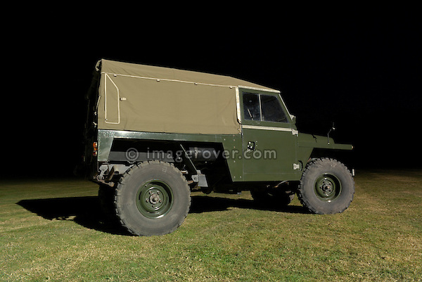 1960's Land Rover prototype Big Lightweight. Dunsfold Collection of Land Rovers Open Day 2006. Dunsfold, Surrey, UK. --- No releases available. Automotive trademarks are the property of the trademark holder, authorization may be needed for some uses. --- Information: Land Rover Big Lightweight, Registration No. VXC 100F, Chassis No. 110-1, 3.0 6-cylinder Petrol engine, 5-speed gearbox, 9.00 tyres. This unusual prototype was one of three built a by Rover as an air portable gun tractor. It was also designed to tow a power driven trailer with the 105mm field gun behind that. It is called the Big Lightweight because of its oversized dimensions and the similarities to the normal Lightweight which was under development at the same time in the 1960's - as well as the 101 Forward Control. The 101 Forward Control won that contract, so this prototype never went into production.