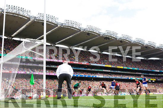 Paul Geaney Kerry in action against Aidan O’Shea and Keith Higgins Mayo in the All Ireland Semi Final Replay in Croke Park on Saturday.
