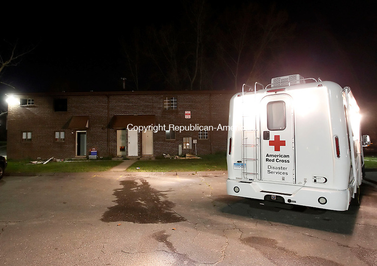 Waterbury, CT- 25 April 2013-042513CM17- An American Red Cross truck is on scene at the Truman Apartment complex in Waterbury after a fire displaced families from three units Thursday night. Christopher Massa Republican-American