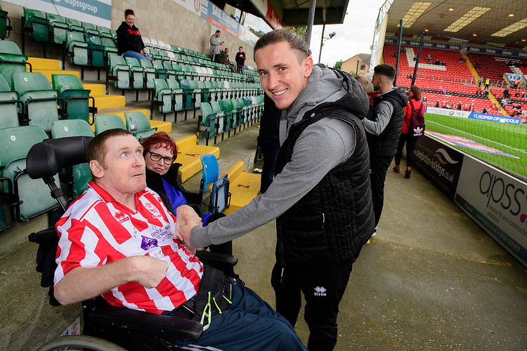 Lincoln City's Aaron Lewis with fans prior to the game<br />
<br />
Photographer Chris Vaughan/CameraSport<br />
<br />
The EFL Sky Bet League One - Lincoln City v Sunderland - Saturday 5th October 2019 - Sincil Bank - Lincoln<br />
<br />
World Copyright © 2019 CameraSport. All rights reserved. 43 Linden Ave. Countesthorpe. Leicester. England. LE8 5PG - Tel: +44 (0) 116 277 4147 - admin@camerasport.com - www.camerasport.com