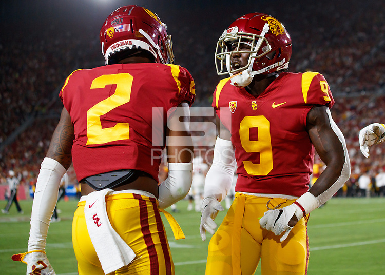 LOS ANGELES, CA - SEPTEMBER 8: USC Trojans cornerback Olaijah Griffin #2 is congratulated by Greg Johnson #9 for breaking up an end zone pass during a game between USC and Stanford Football at Los Angeles Memorial Coliseum on September 7, 2019 in Los Angeles, California.