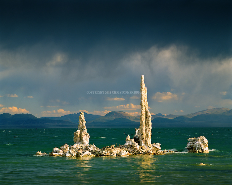 Mono Lake, a large, shallow terminal (no outlet) saline lake formed at least 760,000 years ago. Diversion of water inflows by Los Angeles beginning in 1920's lowered lake levels 30% by 1982, exposing previously submerged calcium carbonate tufa formations and threatening vital migratory bird resting area and food sources. Nearly 2,000,000 waterbirds, including 35 species of shorebirds, use Mono Lake to rest and eat for at least part of the year including second largest nesting population of California gulls. Name "Mono" from "Monachi", a Yokut term for the tribes that lived on both the east and west side of the Sierra Nevada. Mono County, CA.