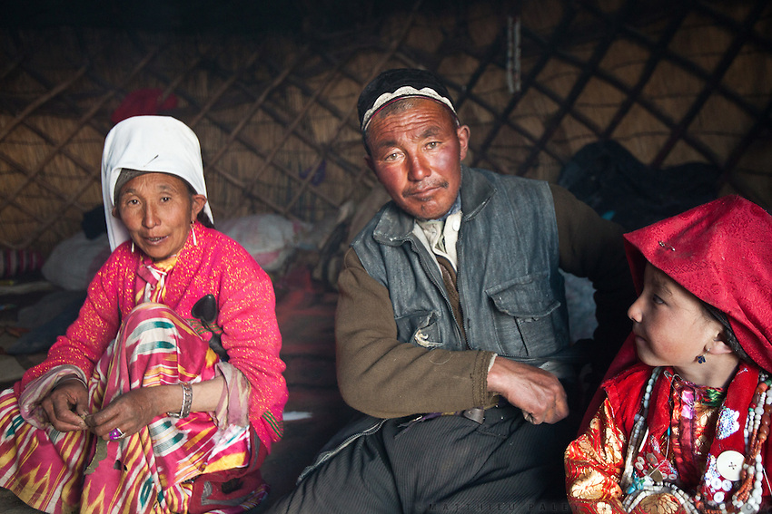 A Kyrgyz family. Abdul Rahman, his wife and one of his daughter. Summer camp of Muqur, Er Ali Boi's place...Trekking through the high altitude plateau of the Little Pamir mountains (average 4200 meters) , where the Afghan Kyrgyz community live all year, on the borders of China, Tajikistan and Pakistan.