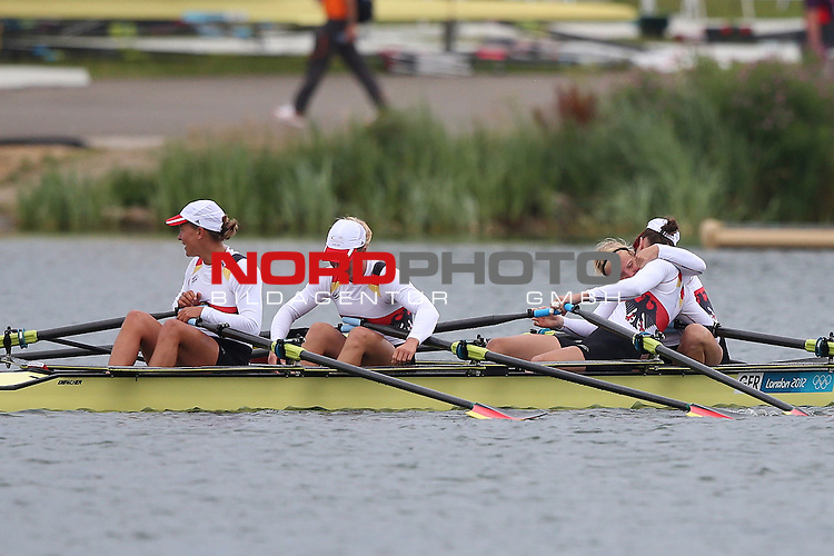 01.08.2012, Eton Dorney, London, Great Britain, Olympische Sommerspiele 2012, Rudern Finale 4er, im Bild<br />
Die deutschen Damen Annekathrin Thiele, Carina Baer, Julia Richter, Britta Oppelt gewinnen die Silber Medaillie / umarmen sich<br />
<br />
Foto © nph / Mueller