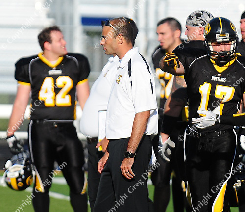 The Madison Mustangs top the Junkyard Dogs 59-14 on Saturday, 6/24/10, at Breitenbach Stadium in Middleton, Wisconsin