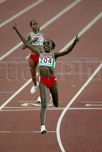 13 August 2005: No 204. Ethiopian athlete Tirunesh Dibaba (ETH) wins the Women's 5000m Final at the IAAF World Athletics Championships, held in the Olympic Stadium, Helsinki, Finland Photo: Glyn Kirk/actionplus...050813 running distance runner woman women athlete female celebration celebrates winner