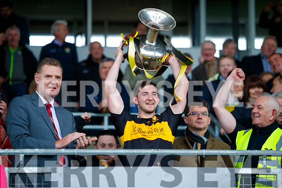 Dr Crokes captain Daithí Casey lifts the Bishop Moynihan cup after his team defeated South Kerry in the Senior County Football Final in Austin Stack Park on Sunday