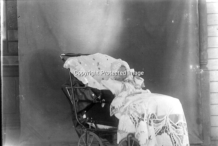 Photographs taken on black and white glass negatives by African American photographer(s) John Johnson and Earl McWilliams from 1910 to 1925 in Lincoln, Nebraska. Douglas Keister has 280 5x7 glass negatives taken by these photographers. Larger scans available on request
