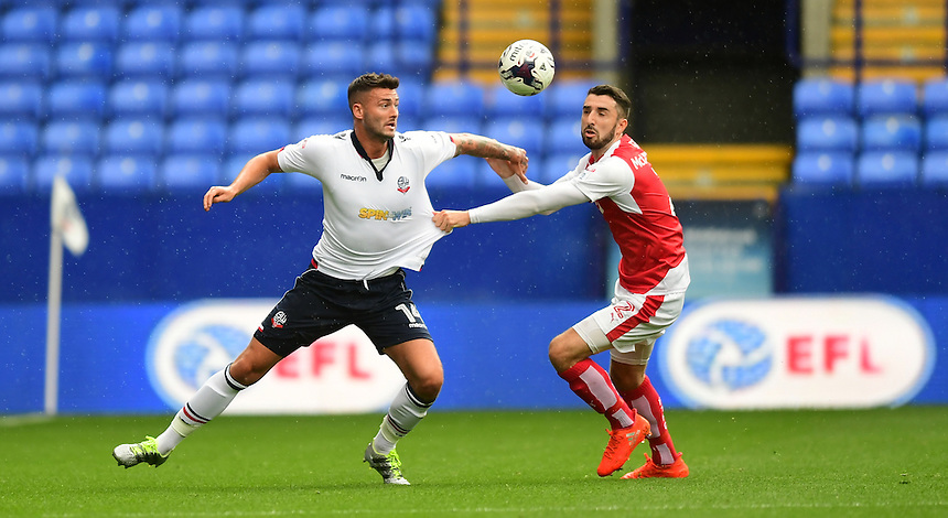 Bolton Wanderers's Gary Madine shields the ball from Fleetwood Town's Conor McLaughlin<br />
<br />
Photographer Chris Vaughan/CameraSport<br />
<br />
Football - The EFL Sky Bet League One - Bolton Wanderers v Fleetwood Town - Saturday 20 August 2016 - Macron Stadium - Bolton<br />
<br />
World Copyright © 2016 CameraSport. All rights reserved. 43 Linden Ave. Countesthorpe. Leicester. England. LE8 5PG - Tel: +44 (0) 116 277 4147 - admin@camerasport.com - www.camerasport.com