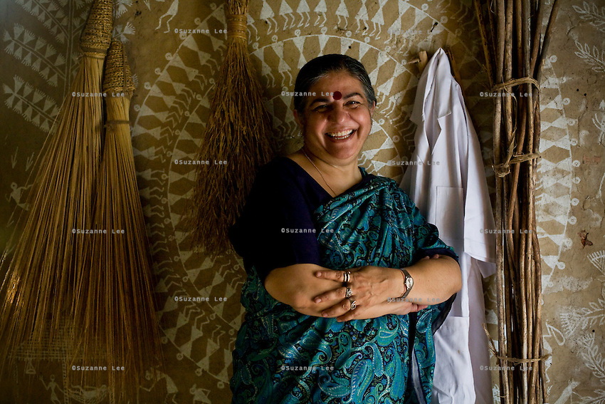 Dr. Vandana Shiva poses amongst dried crops and her laboratory coat in the Navdanya Seed bank in Dehradun, Uttarakhand, India, on 6th September 2009. The inside walls of the seed bank have all been painted by Gujarati and Rajasthani tribal artists...Dr. Vandana Shiva, the founder of Navdanya Foundation and Bijavidyapeeth, is a physicist turned environmentalist who campaigns against genetically modified food and teaches farmers to rely on indigenous farming methods.. .Photo by Suzanne Lee / For The National