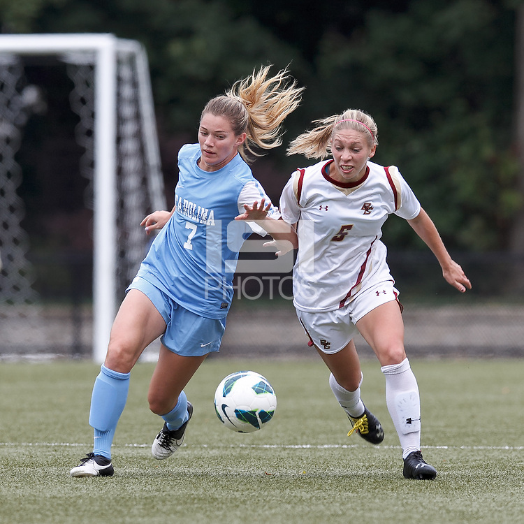 University of North Carolina forward Kealia Ohai (7) and Boston College midfielder Lauren Bernard (5) battle for the ball. University of North Carolina (blue) defeated Boston College (white), 1-0, at Newton Campus Field, on October 13, 2013.