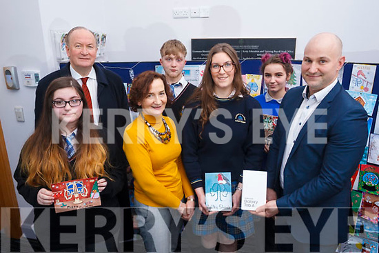 The runners up and winner of the Kerry ETB Christmas card competition, l to r: Emilia Girasole (Coaiste na Riochta), Cllr: Jim Finuchan, Conor Hope (Colaiste na Riochta), Ann O’Dwyer (Dir of Schools Kerry ETB) presenting to the winner Caiomhe Curran (Colaiste na Sceilge), Agna Arl Auskaite (Castleisland Community College) and Brendan Culloty (Hugh Culloty Experts Tralee).