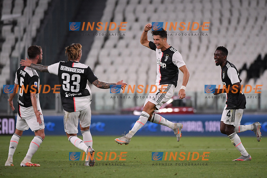 Cristiano Ronaldo of Juventus celebrates with Miralem Pjanic, Federico Bernardeschi and Blaise Matuidi after scoring the goal of 1-0 during the Serie A football match between Juventus FC and UC Sampdoria at Juventus stadium in Turin (Italy), July 26th, 2020. Play resumes behind closed doors following the outbreak of the coronavirus disease. <br />
Photo Federico Tardito / Insidefoto