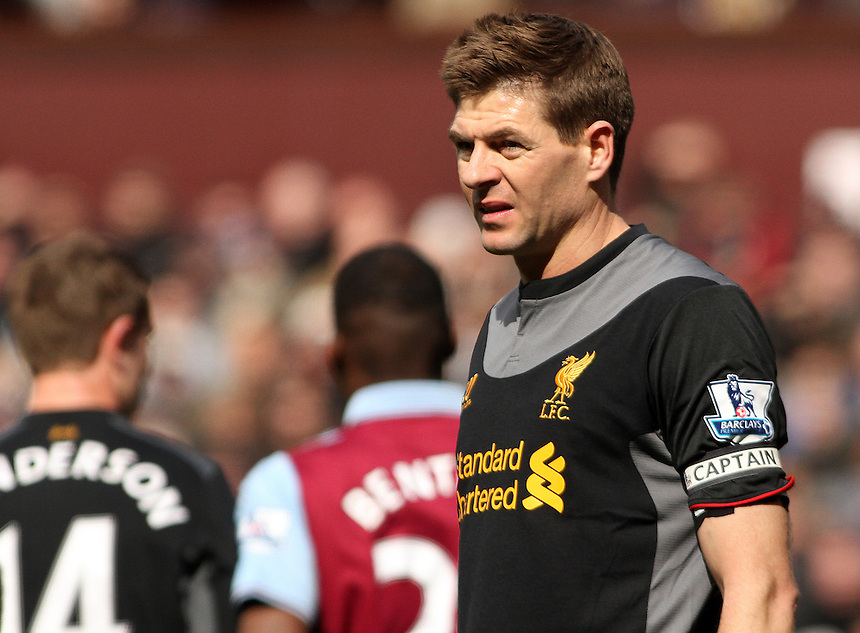 Liverpool's Steven Gerrard in action during todays match...- Credit - CameraSport - James Marsh - ..Football - Barclays Premiership - Aston Villa v Liverpool - Sunday 31st March 2013 - Villa Park - Birmingham ..© CameraSport - 43 Linden Ave. Countesthorpe. Leicester. England. LE8 5PG - Tel: +44 (0) 116 277 4147 - admin@camerasport.com - www.camerasport.com