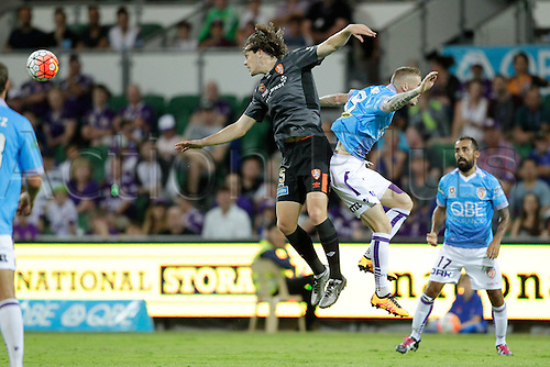 20.02.2016, Perth, Australia. Hyundai A-League, Perth Glory versus Brisbane Roar. James Donachie and Andrew Keogh compete for the header during the first half. Perth Glory defeated Brisbane Roar 6-3.